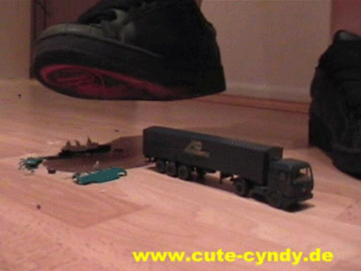 Cindy crushes toy cars under her sneakers